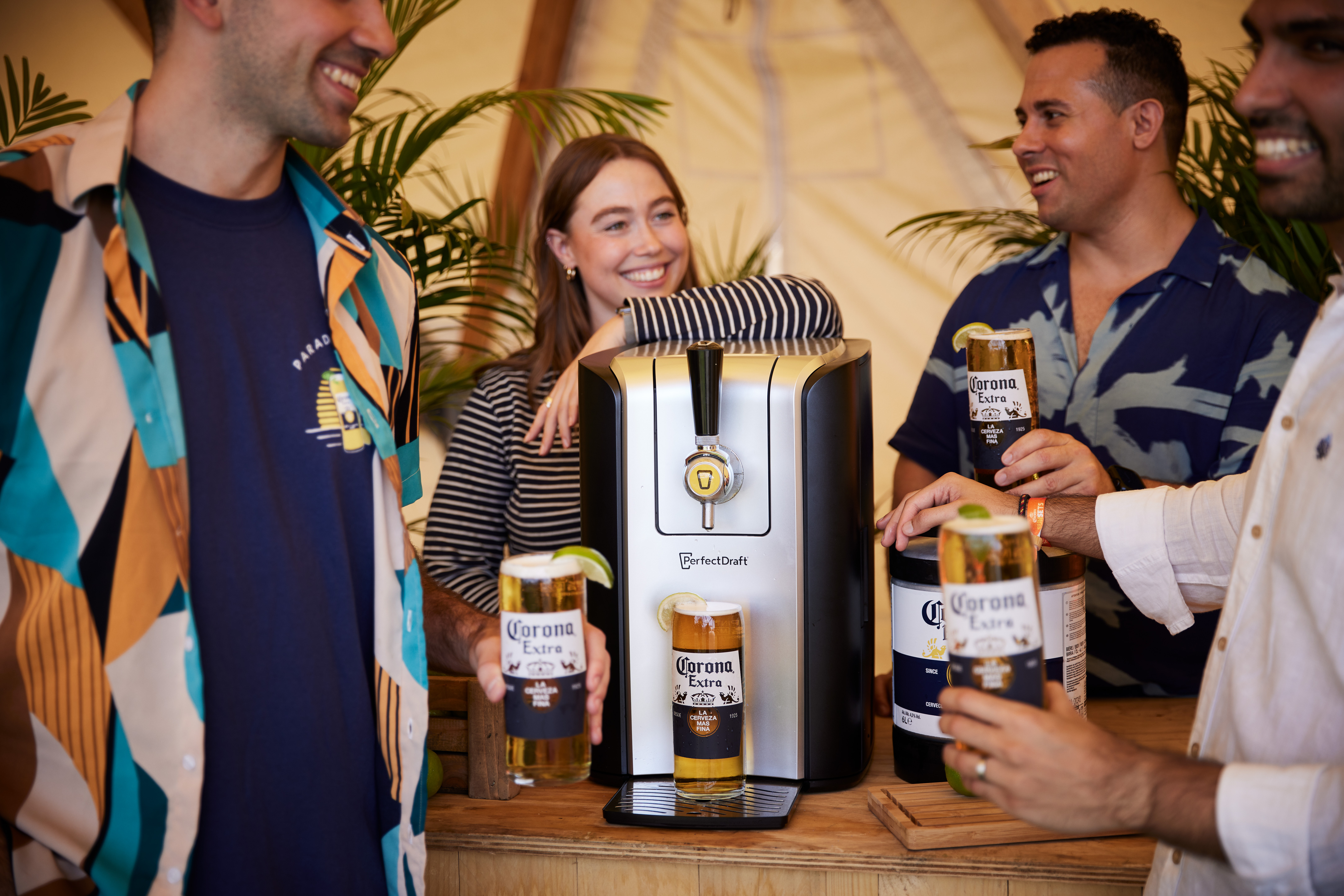 People enjoying a Corona from a PerfectDraft